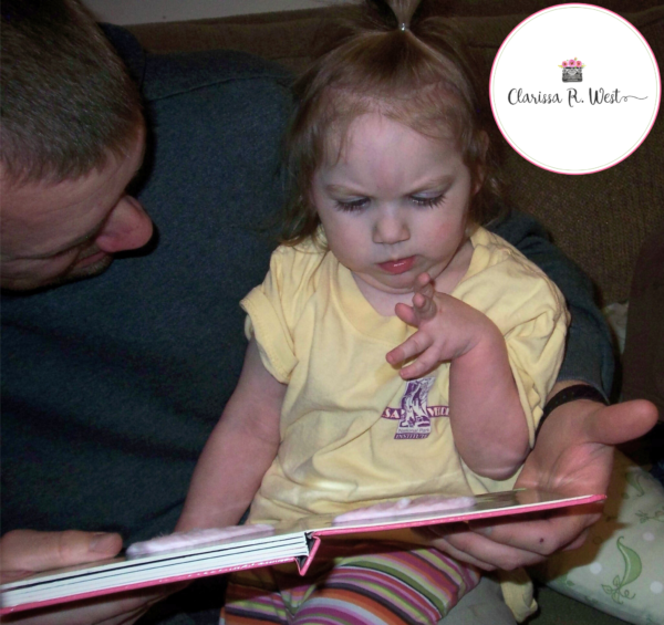 daddy reads to abigail